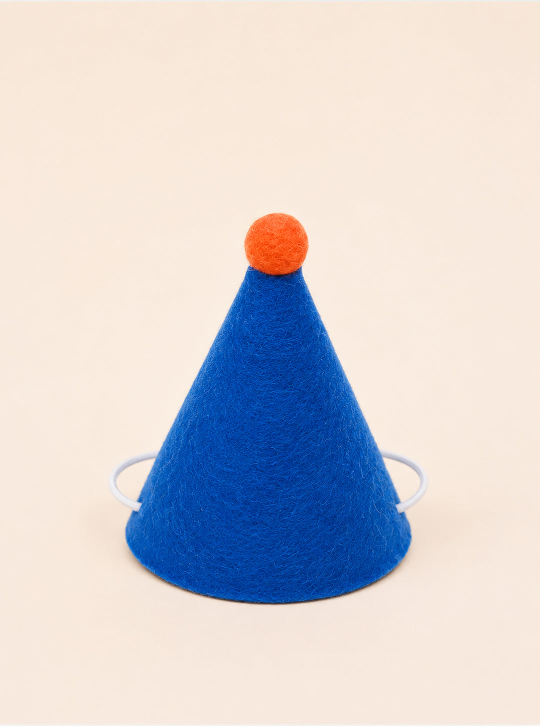 Blue felt party hat with an orange pom-pom on top and elastic bands for secure wear. Ideal for pets' celebrations.