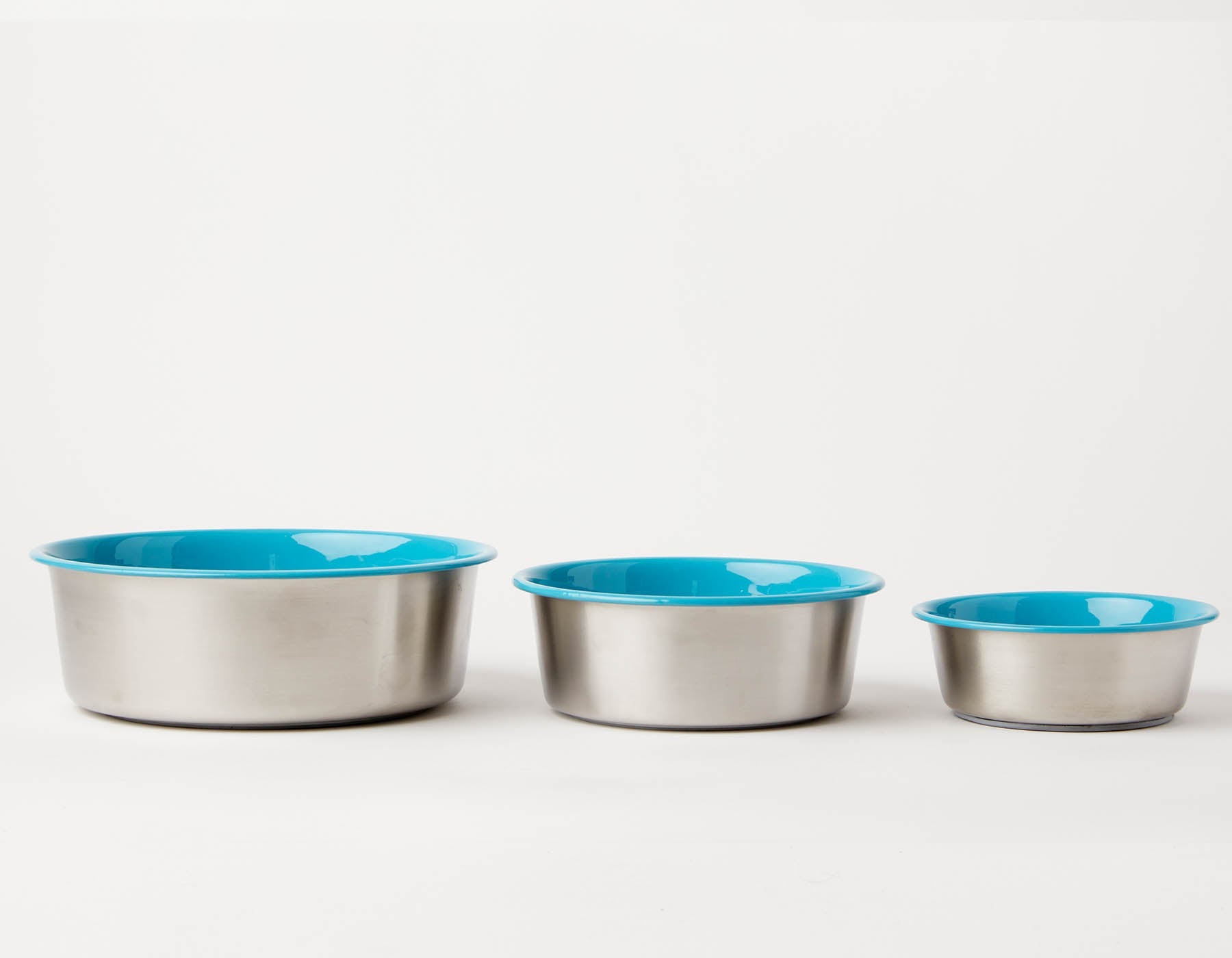 Southlake Paws Slow Feeder Dog Bowl Blue - Anti Slip Stainless Steel set of three bowls in varying sizes with blue interiors.