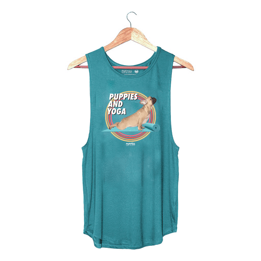 Teal sleeveless tank top featuring a playful graphic of a puppy on a yoga mat with the text "Puppies and Yoga." Perfect gift 