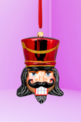 Load image into Gallery viewer, Crimson Glass Nutcracker Ornament - Southlake Paws
