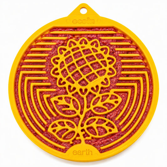 Earth eCoin Nylon Lick Mat for Dogs by Southlake Paws, featuring a sunflower design in yellow with a textured surface for enr