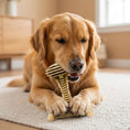 Load image into Gallery viewer, Golden retriever chewing on a Honey Bone Dental Tower chew toy made of indestructible nylon, set in a cozy indoor space.
