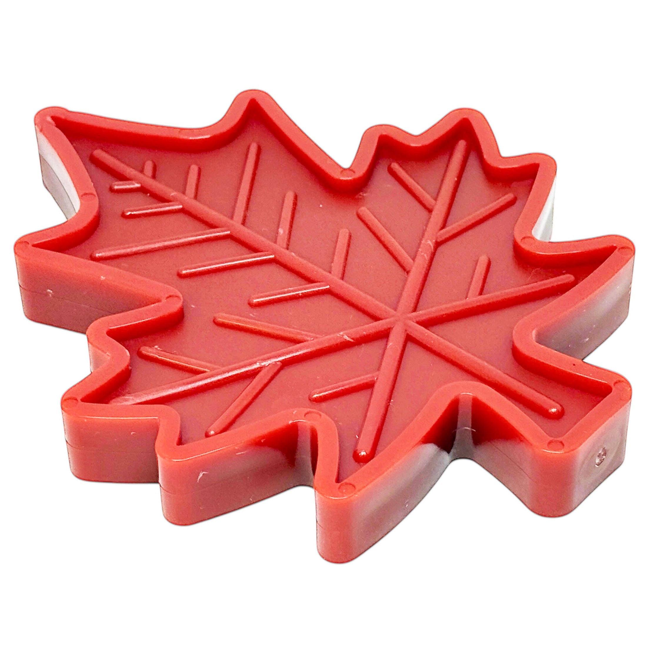 Red Canadian maple leaf-shaped nylon dog chew toy by Southlake Paws, designed to be indestructible and made in the USA.