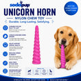 Load image into Gallery viewer, Southlake Paws Unicorn Horn Nylon Dog Chew Toy in pink, designed for aggressive chewers, with a dog happily chewing on it.
