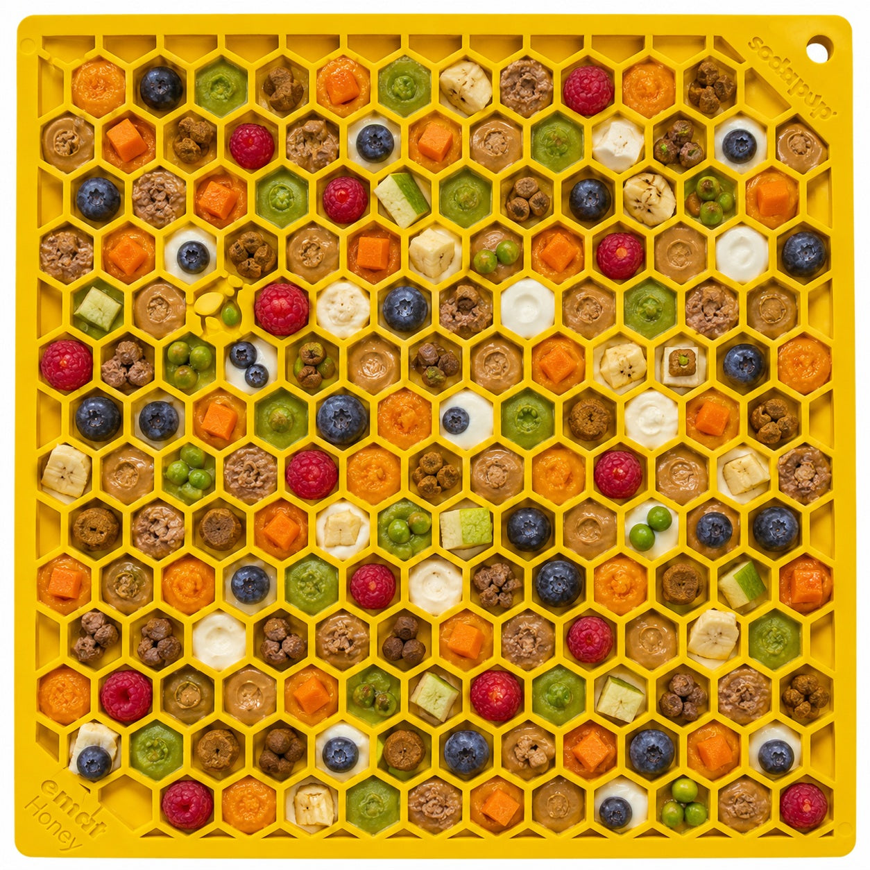 Honeycomb eMat by Southlake Paws features a vibrant, textured surface with hexagonal compartments filled with various pet-fri