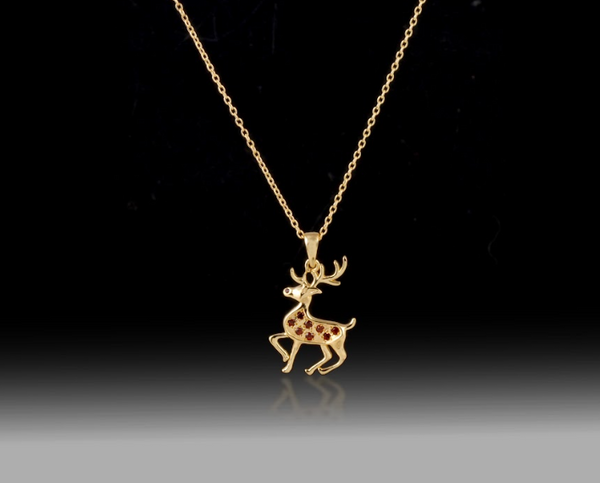 Red Garnet Reindeer Necklace by Southlake Paws, featuring a 925 sterling silver pendant with red garnet accents on a gold cha
