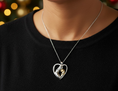 Load image into Gallery viewer, Girl Hugging Dog Heart Shaped Pendant- 925 Sterling Silver Two Toned Piece
