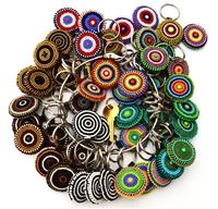 Colorful TKC Beaded Keychain by Southlake Paws featuring various circular bead designs on metal key rings.
