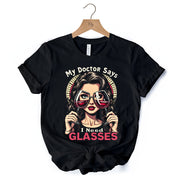 I Need Glasses Funny Wine T-Shirt, Retro Glam Black Tee for Stylish and Witty Women 