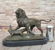 Majestic Bronze Lion vs Crocodile Statue by  Delabrierre – Wildlife Showdown on Marble Base