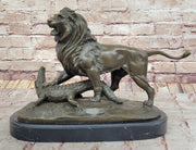 Majestic Bronze Lion vs Crocodile Statue by  Delabrierre – Wildlife Showdown on Marble Base