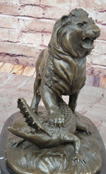 Majestic Bronze Lion vs Crocodile Statue by  Delabrierre – Wildlife Showdown on Marble Base