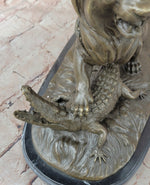 Majestic Bronze Lion vs Crocodile Statue by  Delabrierre – Wildlife Showdown on Marble Base