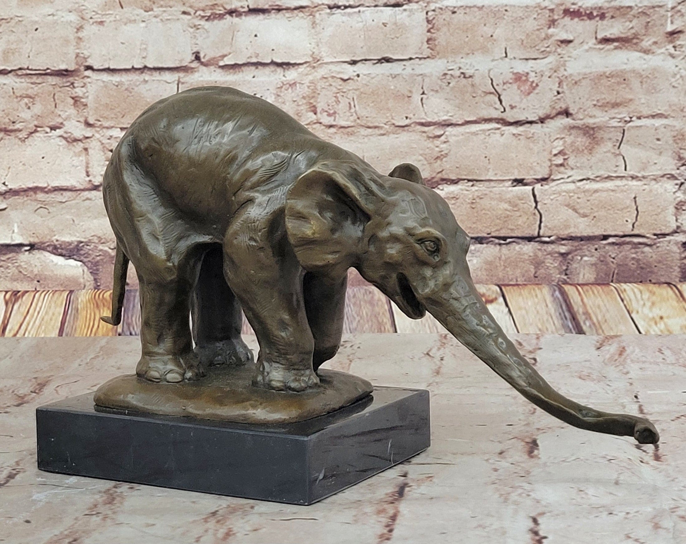 Bronze Elephant Sculpture with Outstretched Trunk – Wildlife Art on Marble Base