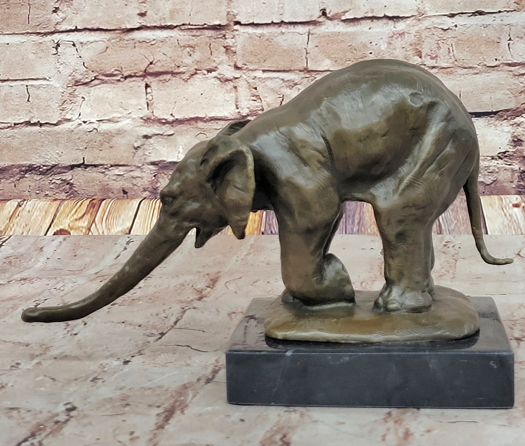 Bronze Elephant Sculpture with Outstretched Trunk – Wildlife Art on Marble Base