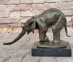 Bronze Elephant Sculpture with Outstretched Trunk – Wildlife Art on Marble Base