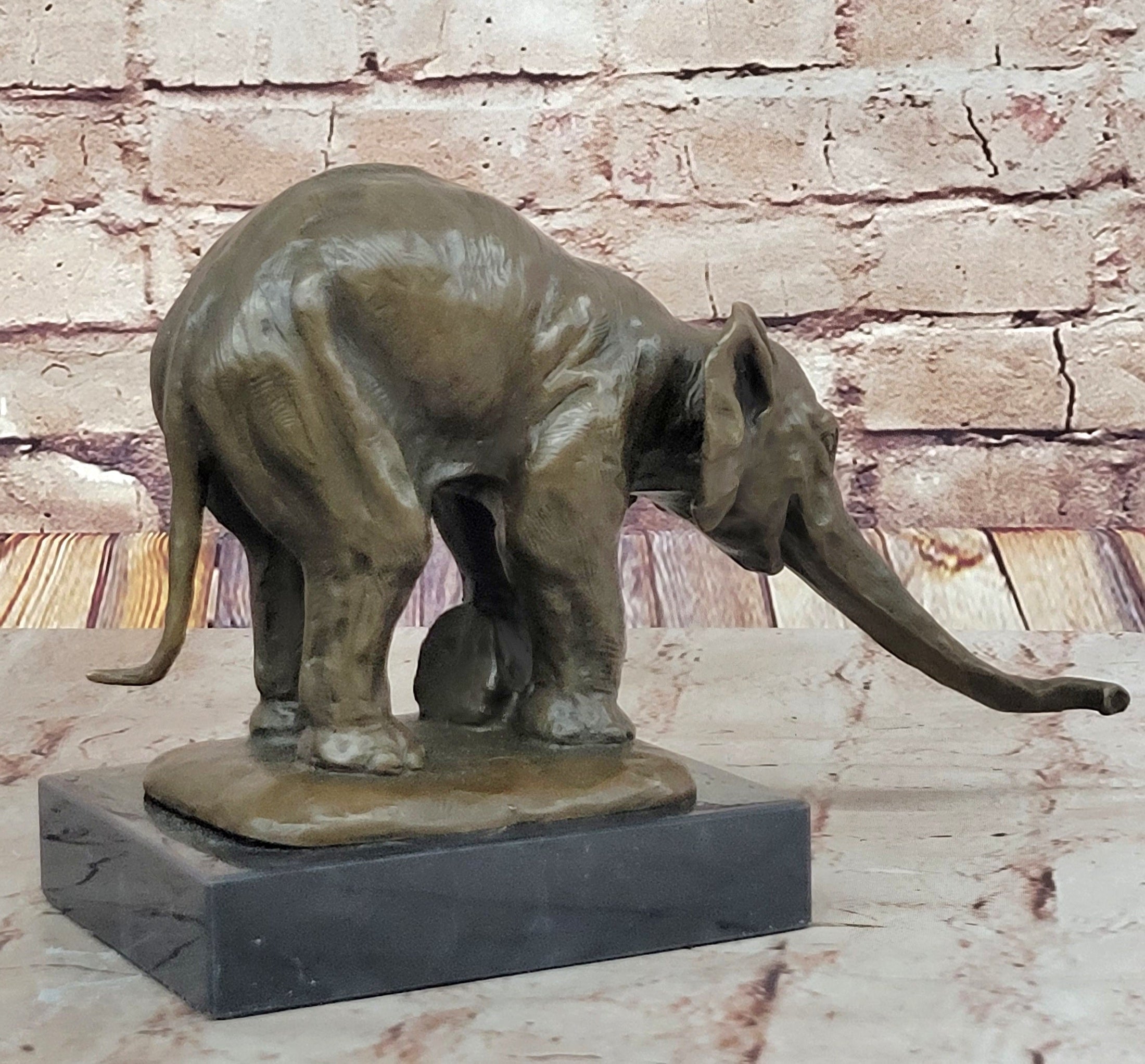 Bronze Elephant Sculpture with Outstretched Trunk – Wildlife Art on Marble Base