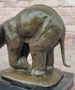Bronze Elephant Sculpture with Outstretched Trunk – Wildlife Art on Marble Base