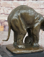 Bronze Elephant Sculpture with Outstretched Trunk – Wildlife Art on Marble Base