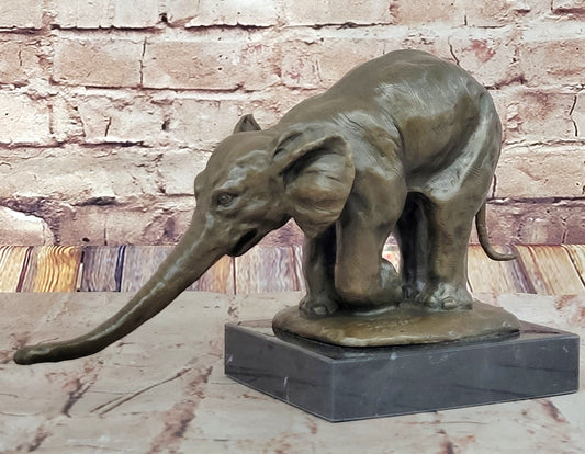 Bronze Elephant Sculpture with Outstretched Trunk – Wildlife Art on Marble Base