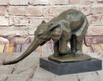 Bronze Elephant Sculpture with Outstretched Trunk – Wildlife Art on Marble Base
