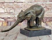 Bronze Elephant Sculpture with Outstretched Trunk – Wildlife Art on Marble Base