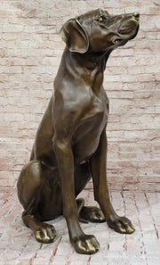 Lifelike Bronze Dog Statue – Realistic Sitting Dog Sculpture for Home or Garden Decor
