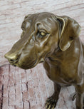 Load image into Gallery viewer, Lifelike Bronze Dog Statue – Realistic Sitting Dog Sculpture for Home or Garden Decor
