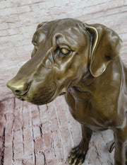 Lifelike Bronze Dog Statue – Realistic Sitting Dog Sculpture for Home or Garden Decor