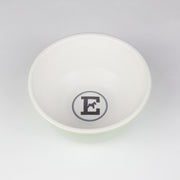 Green and white ceramic dog bowl