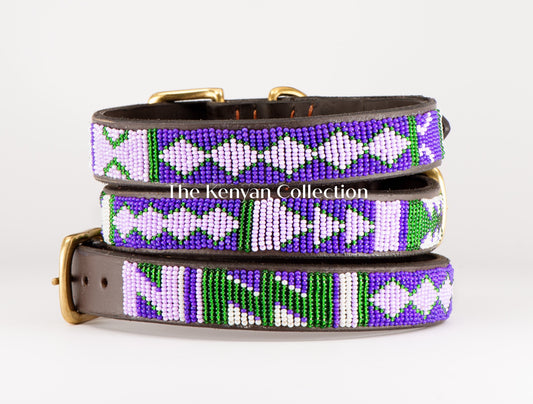 Beaded dog collar by Southlake Paws featuring a colorful geometric pattern in purple, green, and white on a brown leather bas