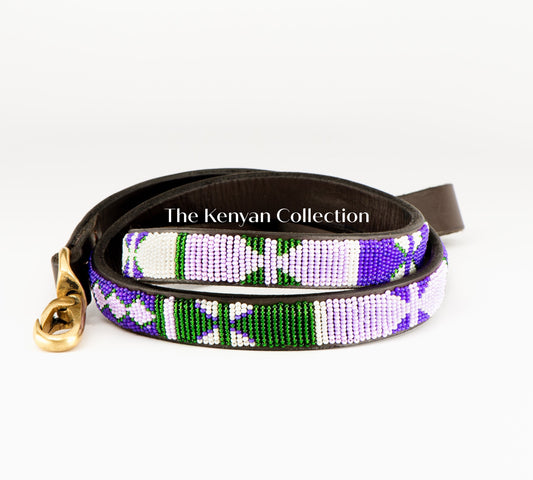 Beaded dog lead from Southlake Paws featuring a colorful design in purple, green, and white with a gold clasp.