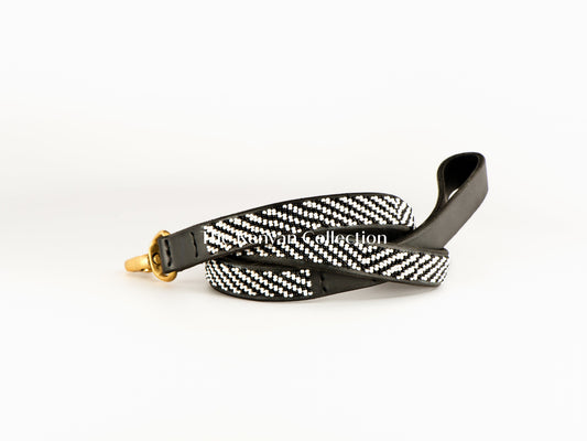 Southlake Paws TKC Zebra Beaded Dog Lead featuring a black leather handle and a beaded zebra pattern.
