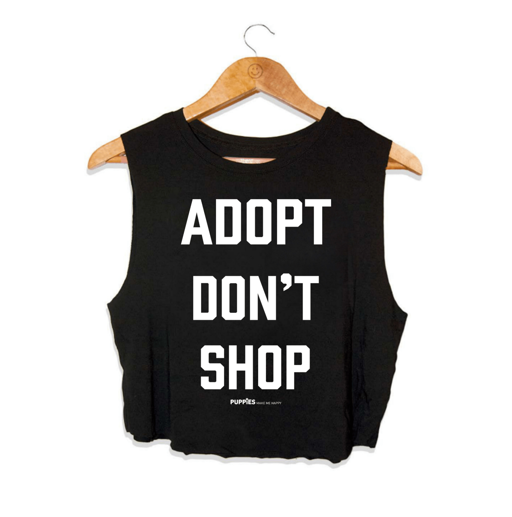 Black crop top with the text "ADOPT DON'T SHOP" in bold white letters, designed for dog lovers. Made in the USA.