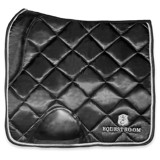 Black saddle pad from Southlake Paws featuring a quilted design and silver trim, ideal for equestrian use.