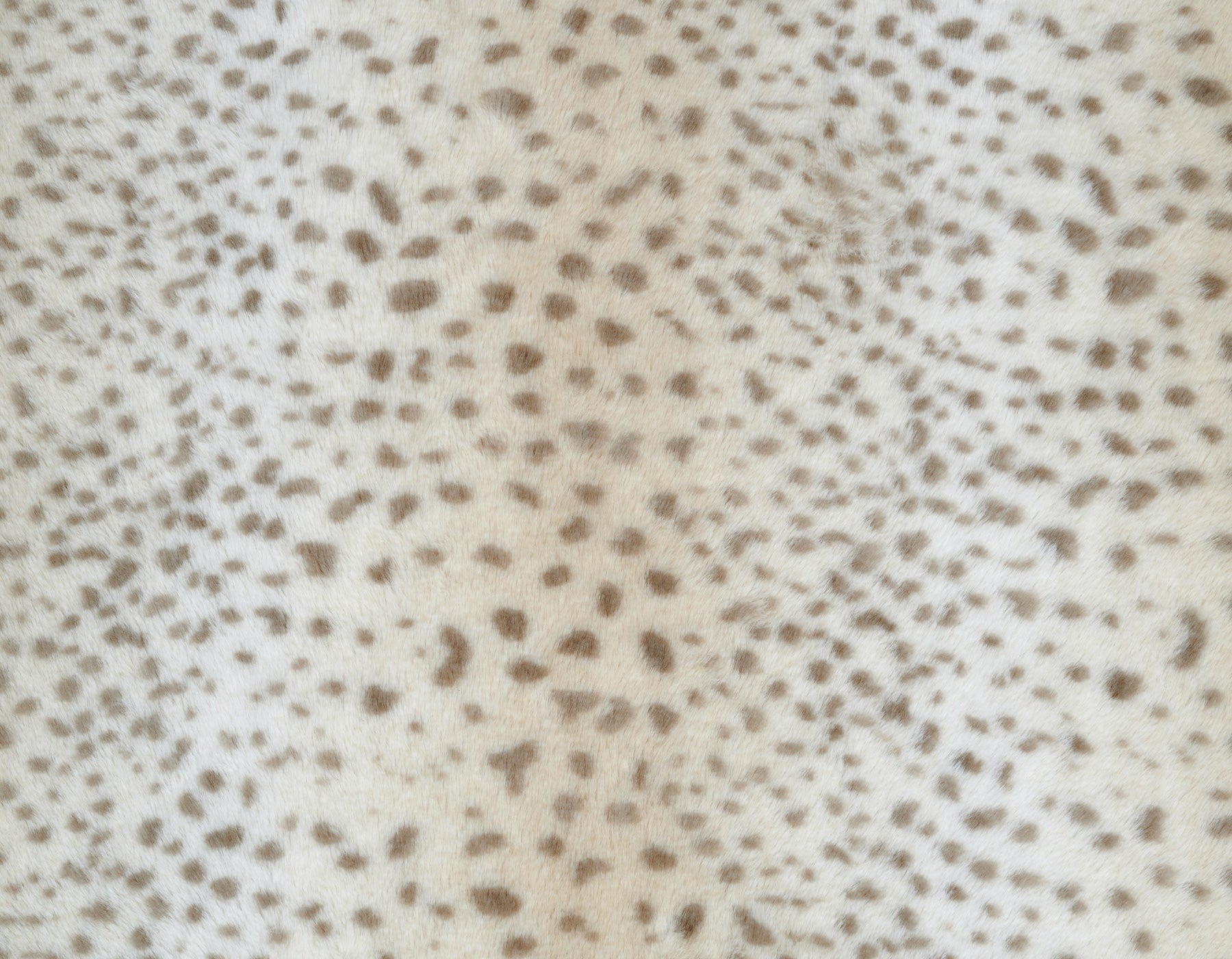 Cheetah Napper Bed by Southlake Paws featuring a soft, spotted fabric pattern resembling cheetah fur.