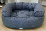 Bowsers Pet Products premium calming bed for pets in gray with soft cushioned design