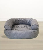 Bowsers Pet Products premium orthopedic donut dog bed in gray with supportive bolstered sides for comfort