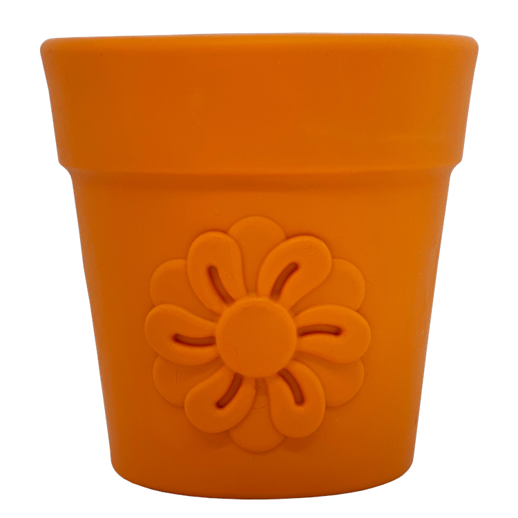 Large orange flower pot-shaped dog treat dispenser with a flower design, made from durable materials for enrichment play.