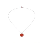Sterling silver necklace with coin and red enamel