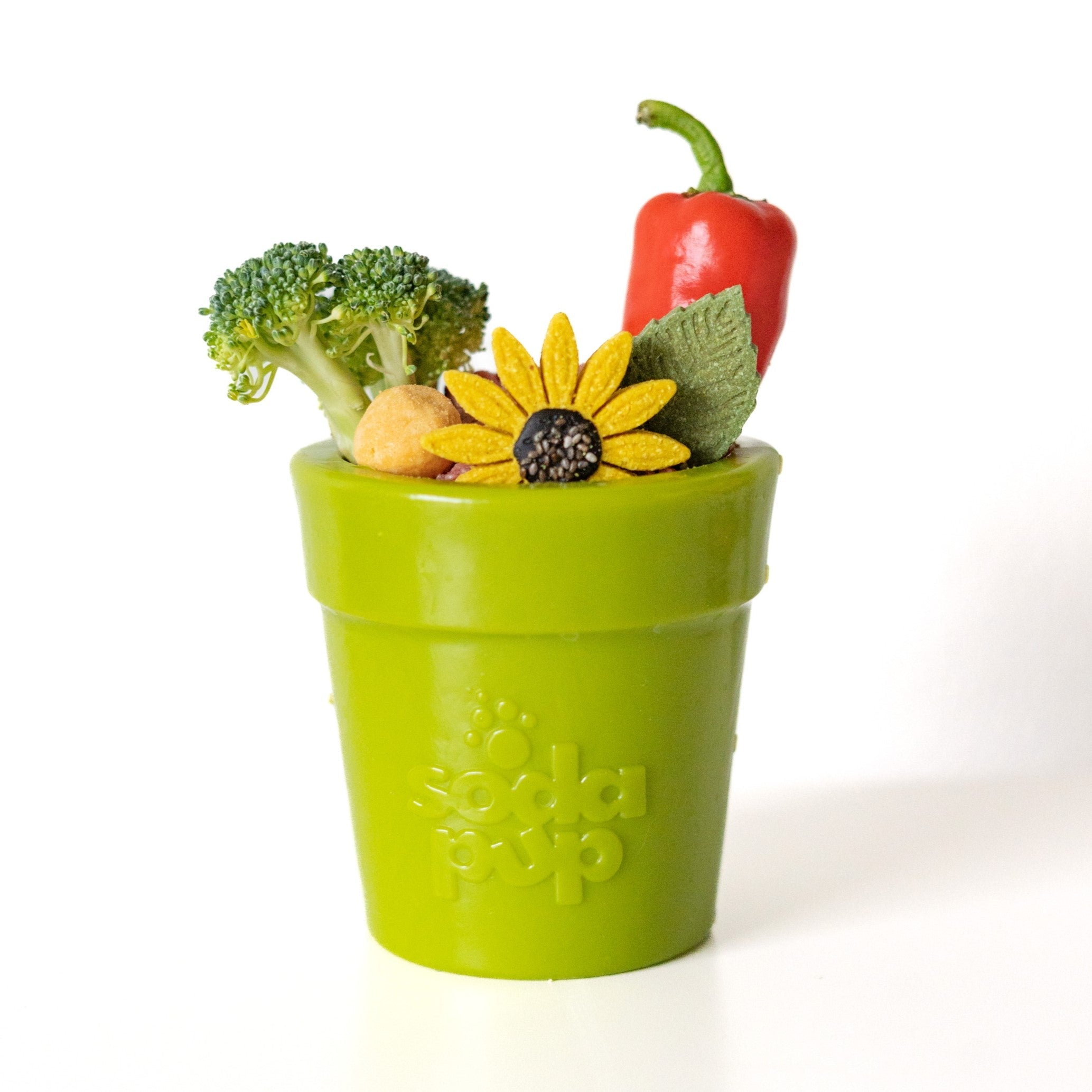 Large Flower Pot eCup Dog Treat Dispenser in green, featuring broccoli, a red pepper, and a sunflower on top. Durable enrichm
