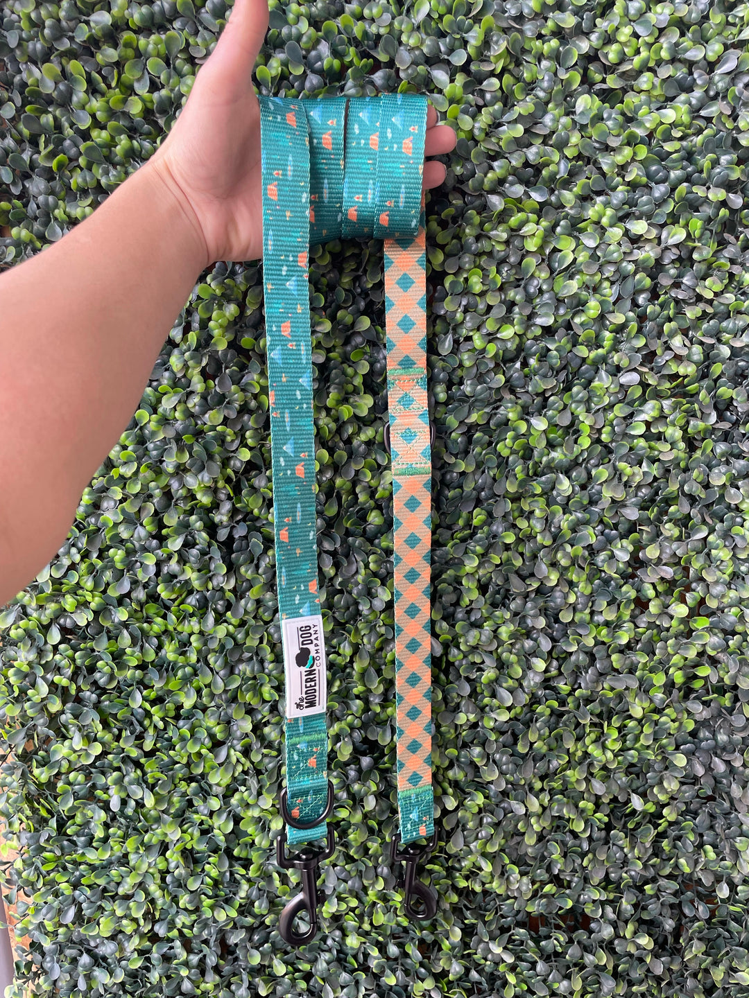 Camping Leash by The Modern Dog Company features a vibrant teal and orange design with clips on both ends, ideal for outdoor 