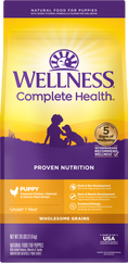 Load image into Gallery viewer, Wellness Complete Health Puppy Chicken, Salmon and Oatmeal Dog Food 
