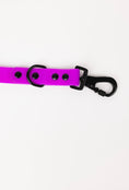 Load image into Gallery viewer, Electric fuchsia dog leash by The Modern Dog Company, featuring weather and odor resistance, with a black clip and hardware.
