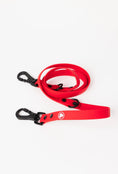 Load image into Gallery viewer, Ruby Red Adjustable Leash by The Modern Dog Company, featuring a sleek design with black clips and adjustable length.
