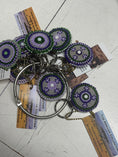 Load image into Gallery viewer, Colorful TKC Beaded Keychains from Southlake Paws, featuring intricate bead designs on metal keyrings with tags.
