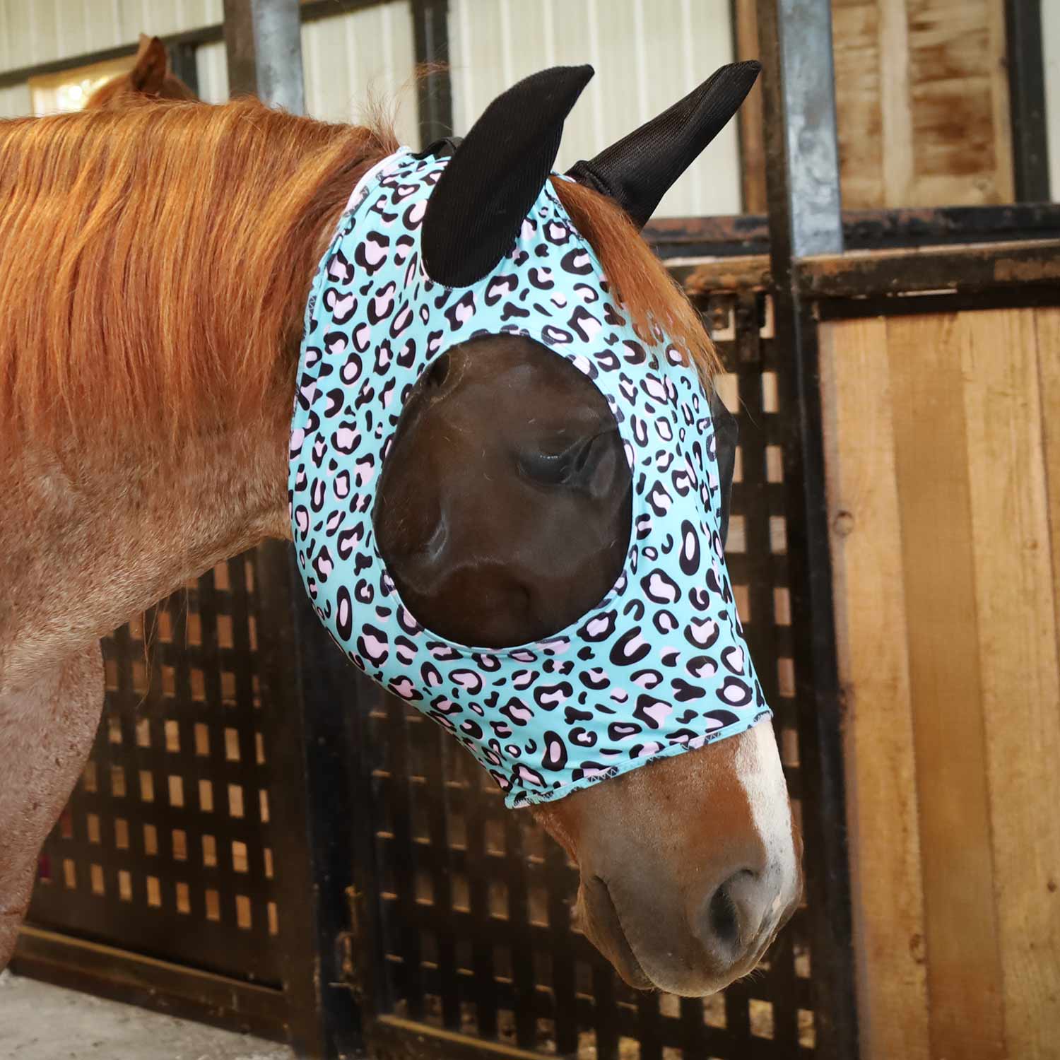 Jeffers Expression Lycra Horse Fly Mask with Ears features a blue leopard print design, fitted over a horse's head.