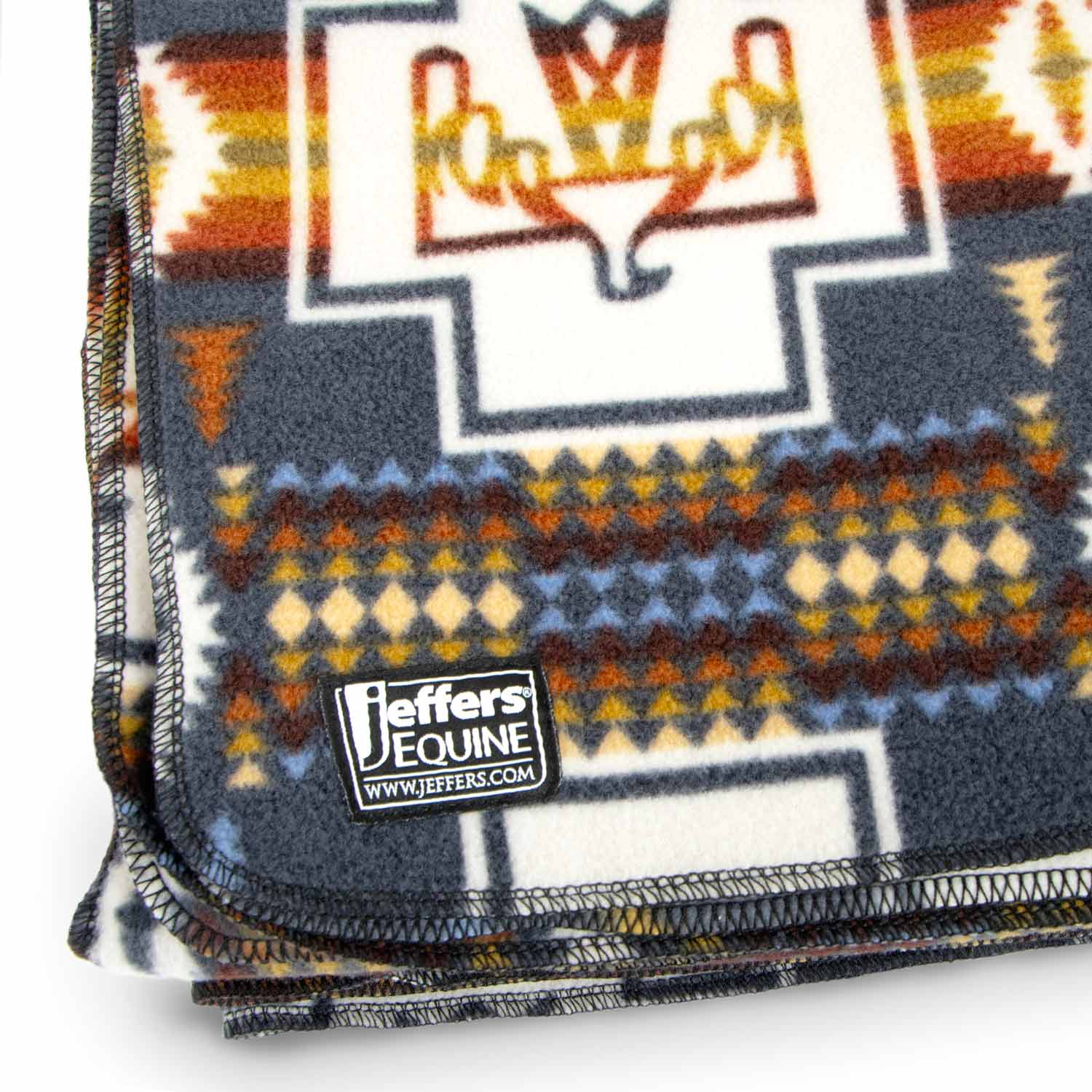 Oversized fleece throw blanket by Jeffers, 60" x 84", featuring a colorful geometric pattern and stitched edges.