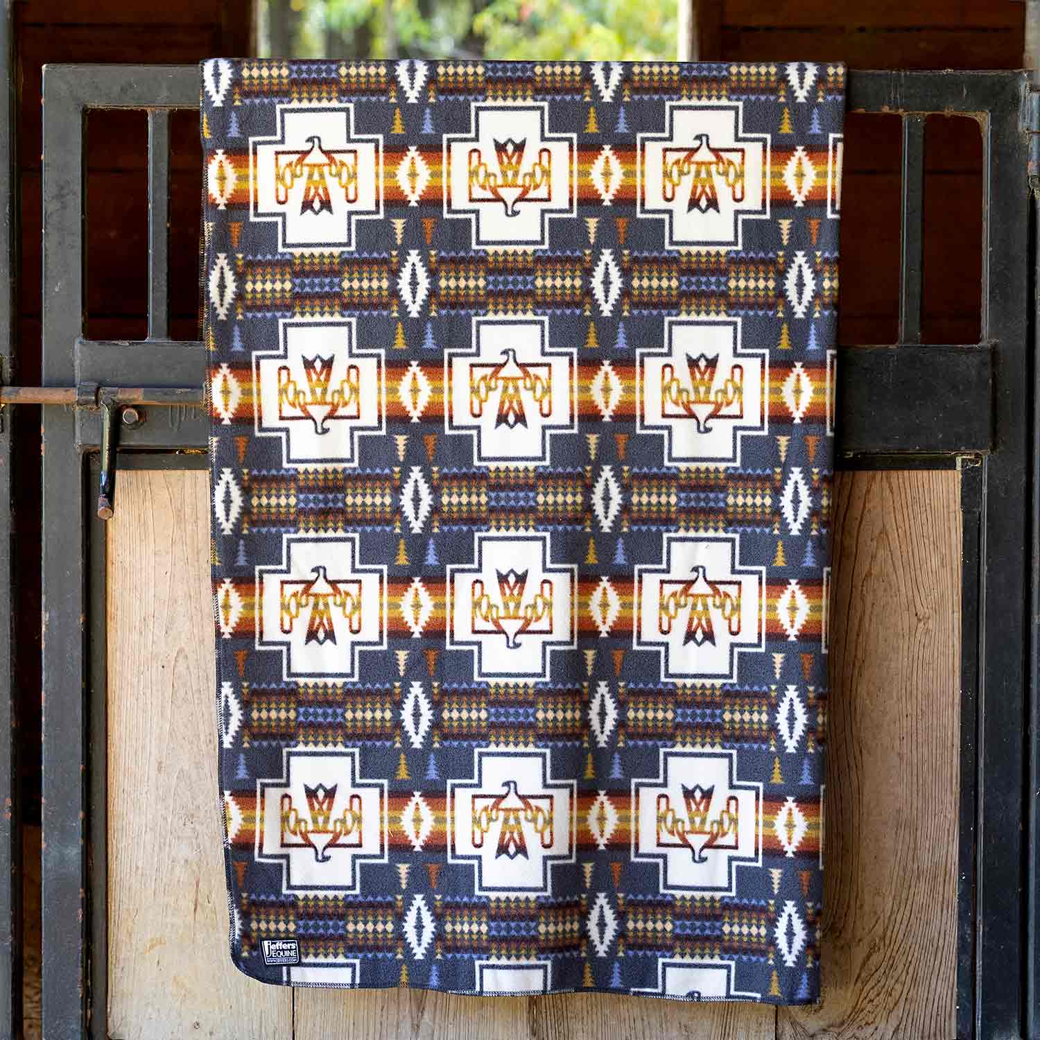 Oversized fleece throw blanket by Southlake Paws, featuring a colorful geometric pattern, measuring 60" x 84".