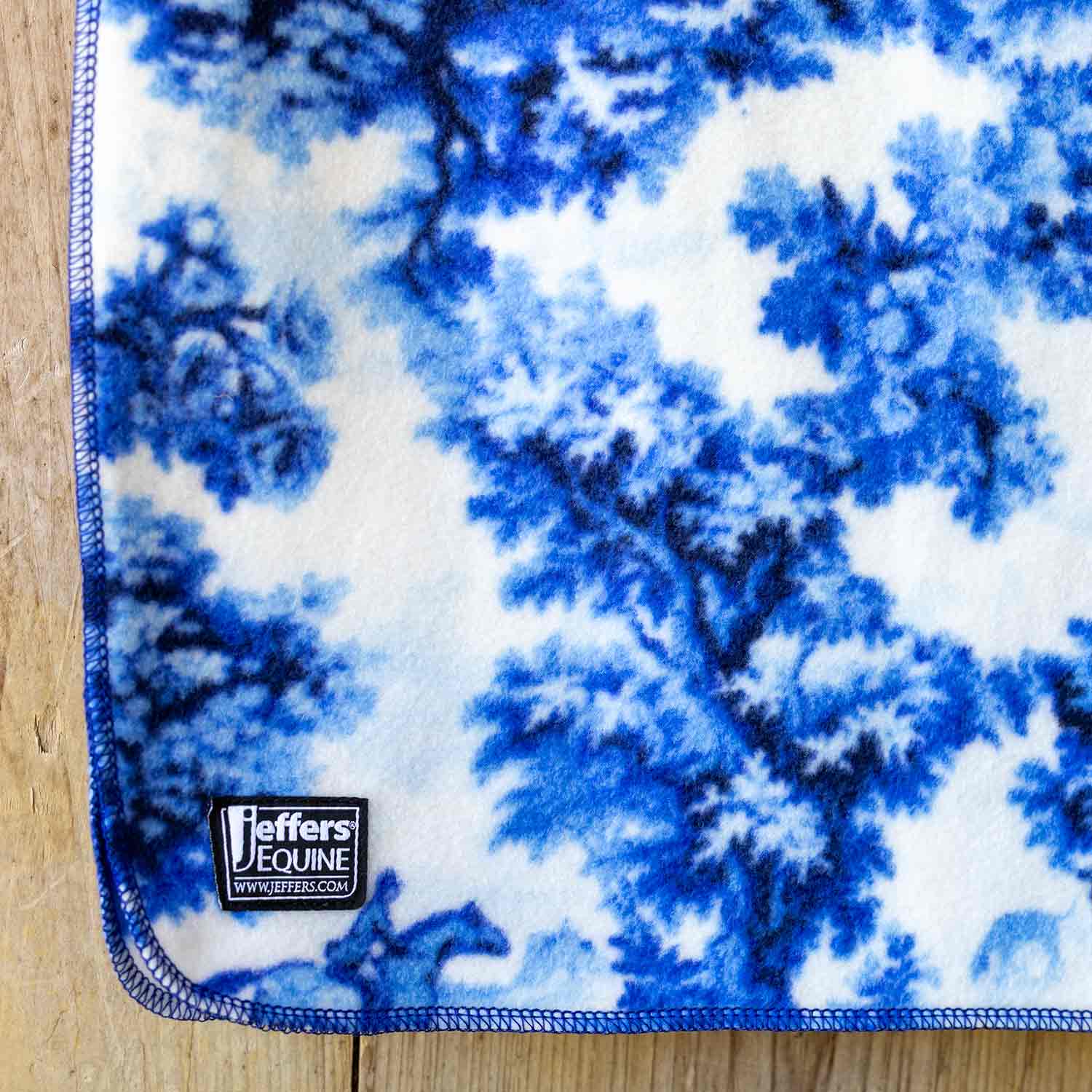 Southlake Paws Jeffers Expression Oversized Fleece Throw Blanket, 60" x 84", featuring a blue and white floral pattern.